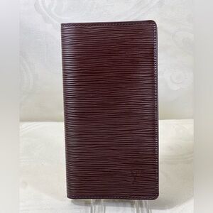 1032: Louis Vuitton Epi Leather Burgundy Long Bifold Wallet